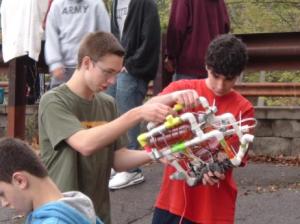 Environmental Science and Robotics classes at collection sites test and launch robots, then collect water samples to be analyzed at the site and in class. Photo from Linda Weber, Project Awardee.