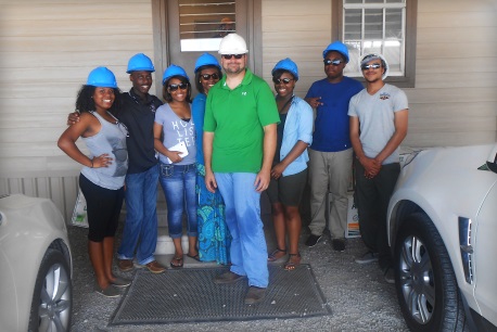 Students visit Scott Kessler at the Cora Texas Manufacturing Company in White Castle, Louisiana to learn first hand about sugar production.