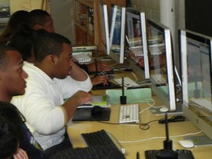 Students working on graphic design projects.