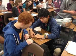 Japanese Students teach American Students how to make Origami Cranes.