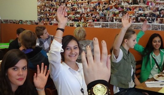 Students participate in a survey of the new Korean foods they just sampled.