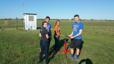 The Cloud Nine rocketry team preparing their rockets for competition in Washington, DC.