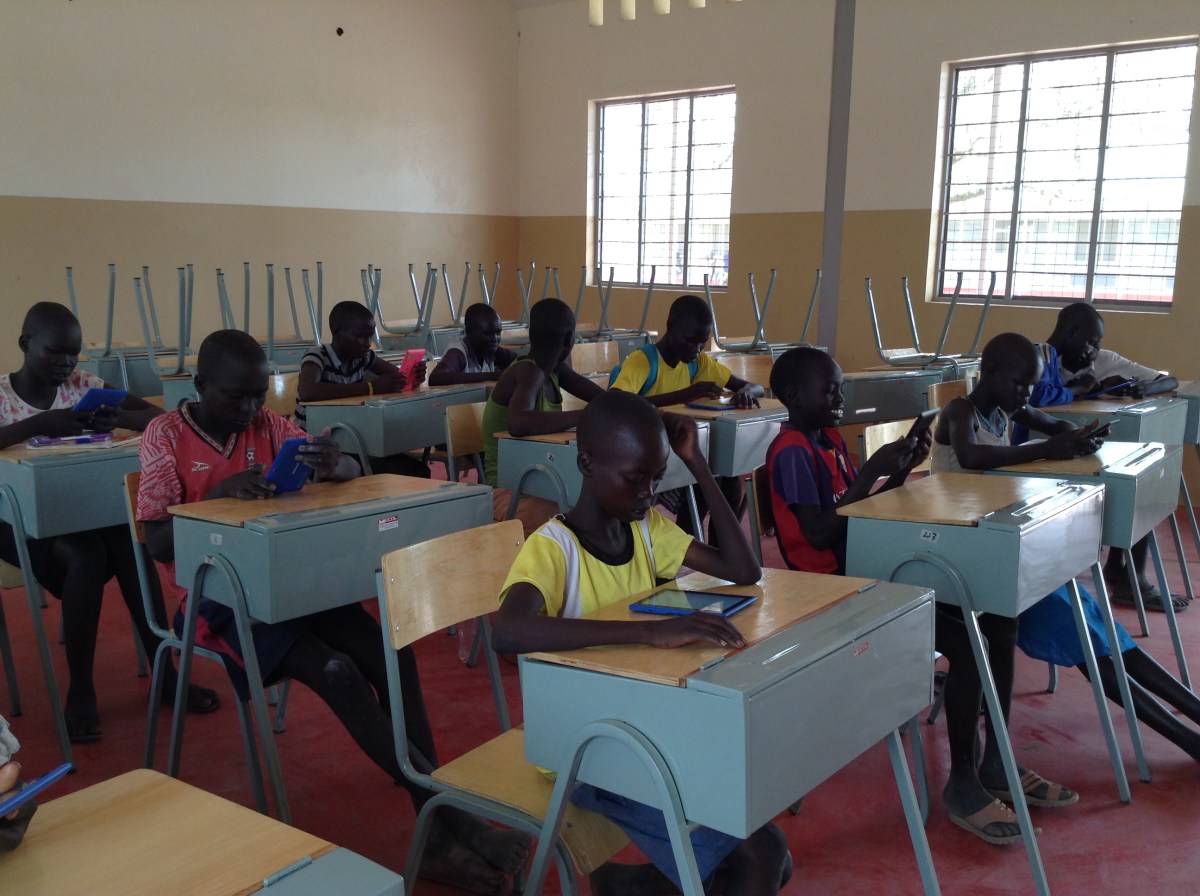 Students work with tablets to improve math and science fluency